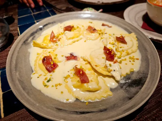 Raviolis con crema de queso